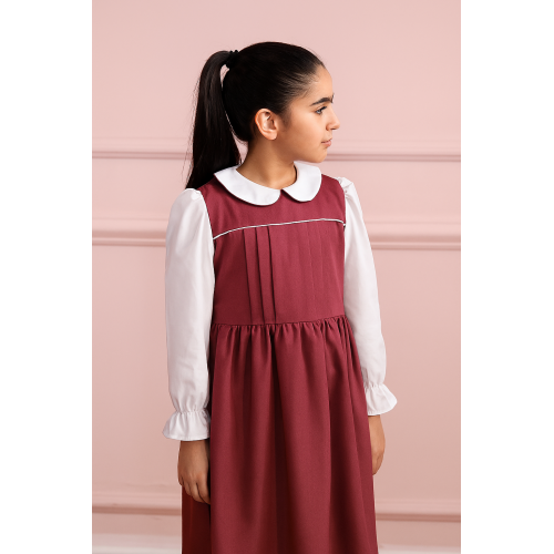 مريول مدرسي متصل وردي بكسرات في الصدر 240423 مريول مدرسي متصل وردي بكسرات في الصدر 240423