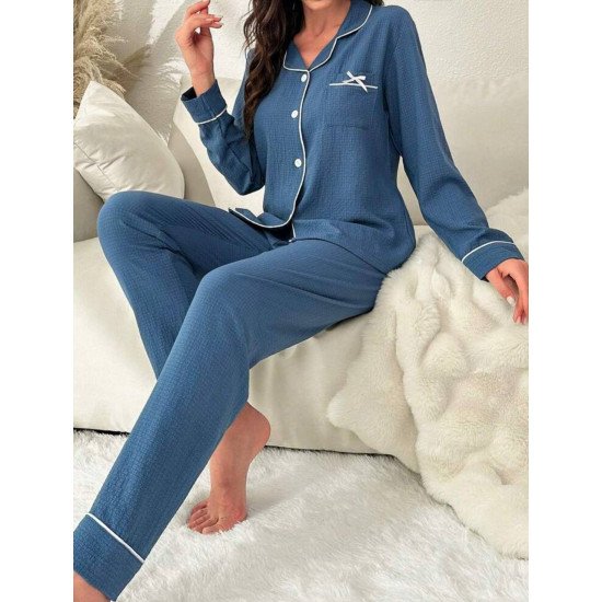 طقم بيجامة للنساء .لون أحادي ,بكم طويل وتصميم فيونكه طقم بيجامة للنساء .لون أحادي ,بكم طويل وتصميم فيونكه